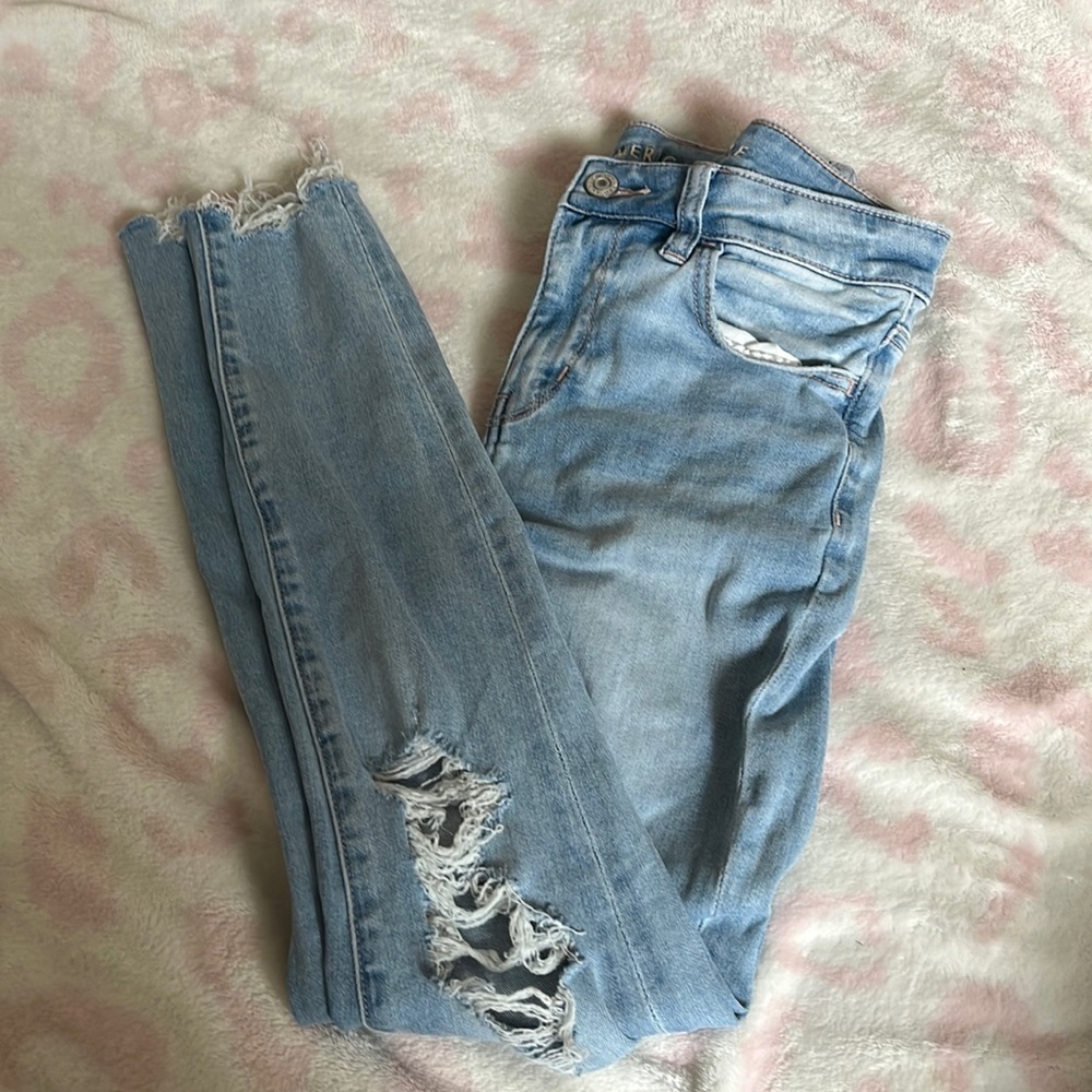 American Eagle ripped skinny jeans.